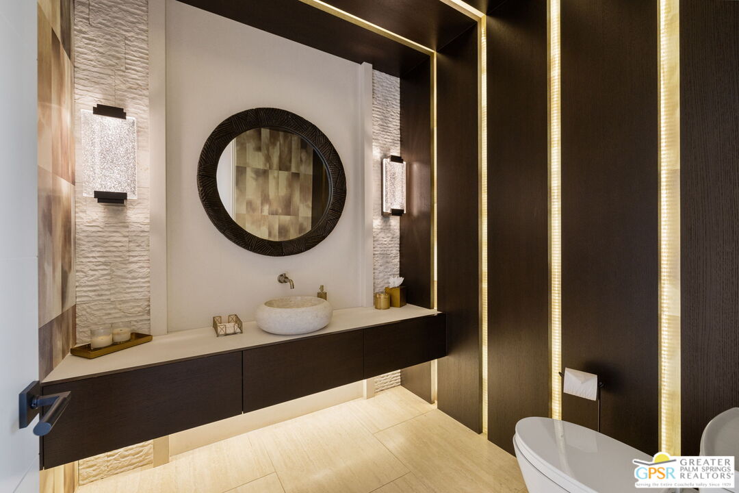 1 Sterling Ridge Drive Rancho Mirage, CA 92270 - Photo 50 of 51 a bathroom with a sink and a mirror