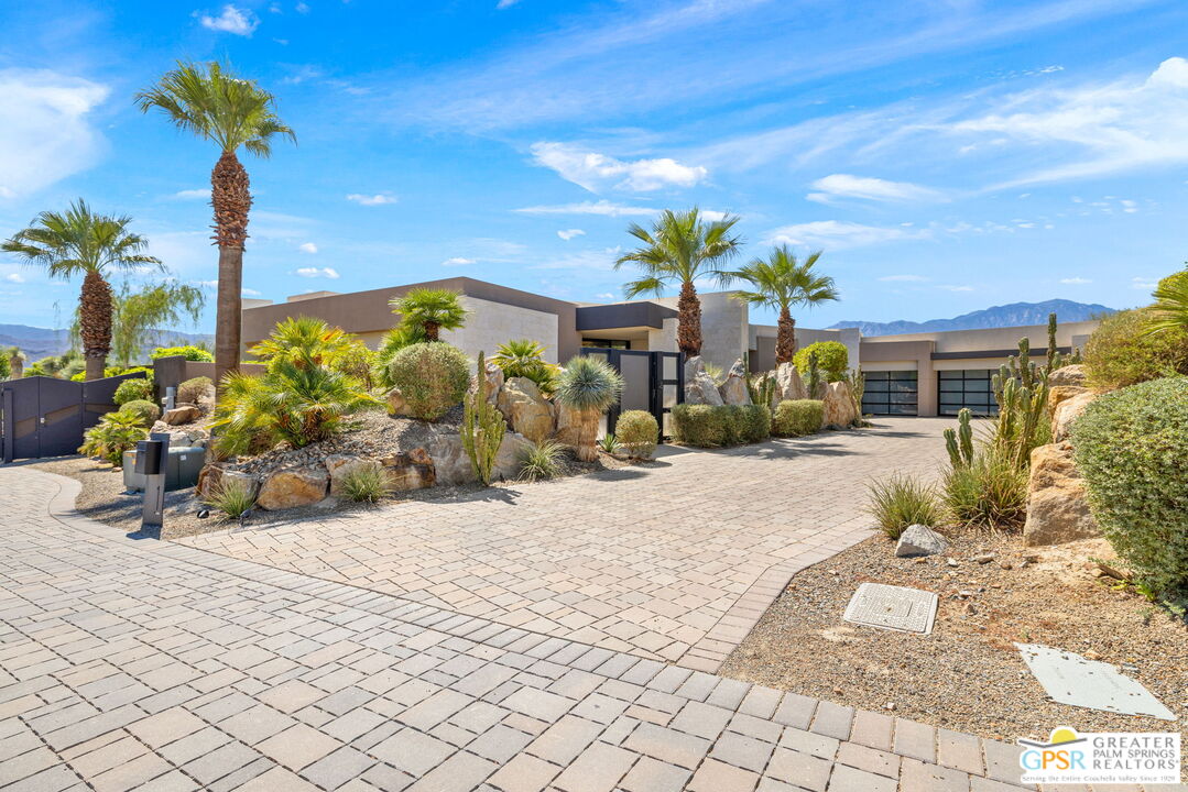1 Sterling Ridge Drive Rancho Mirage, CA 92270 - Photo 9 of 51 a view of a terrace with a bench