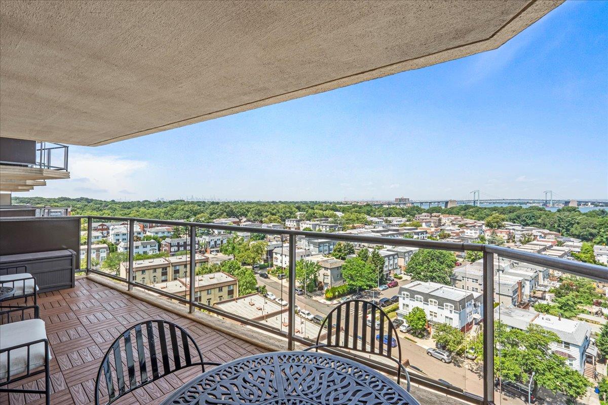 17-85 215th Street, Unit 12S Queens, NY 11360 - Photo 12 of 37 Balcony with a city view