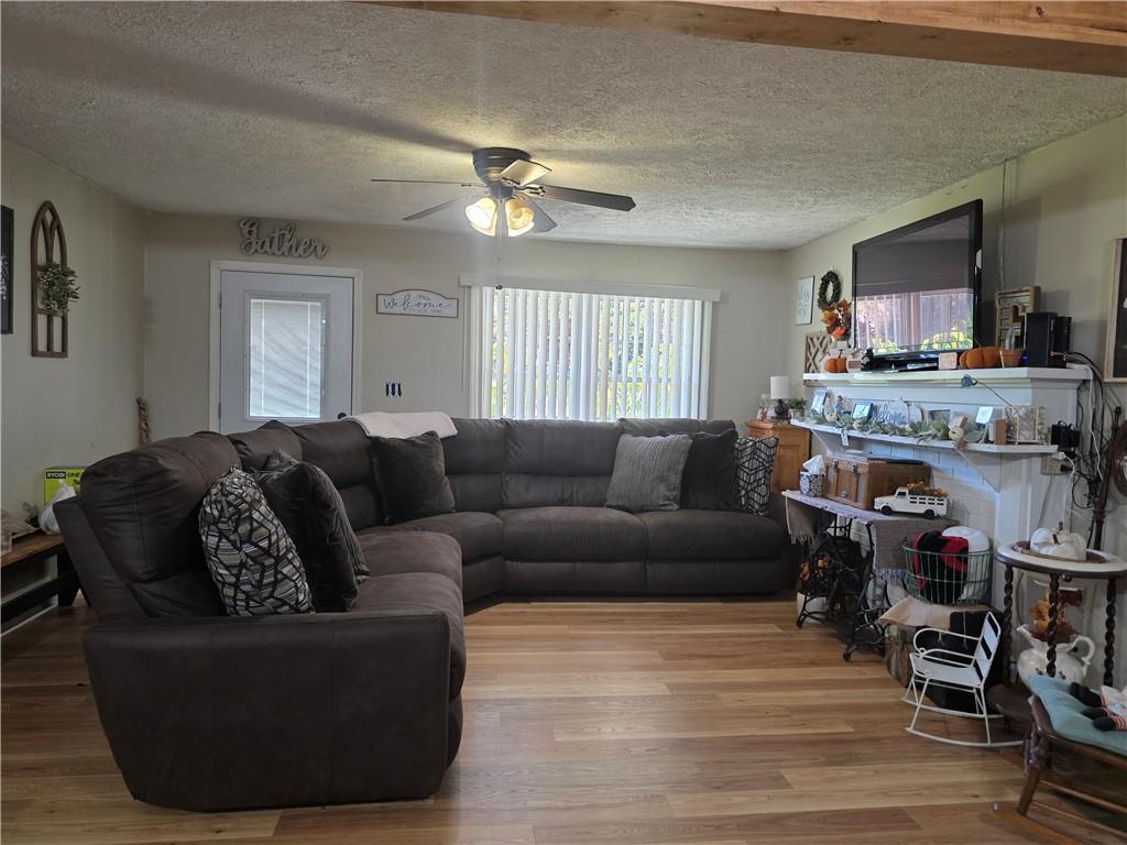 176 Runyon Loop Cedartown, GA 30125 - Photo 3 of 20 a living room with furniture and a flat screen tv