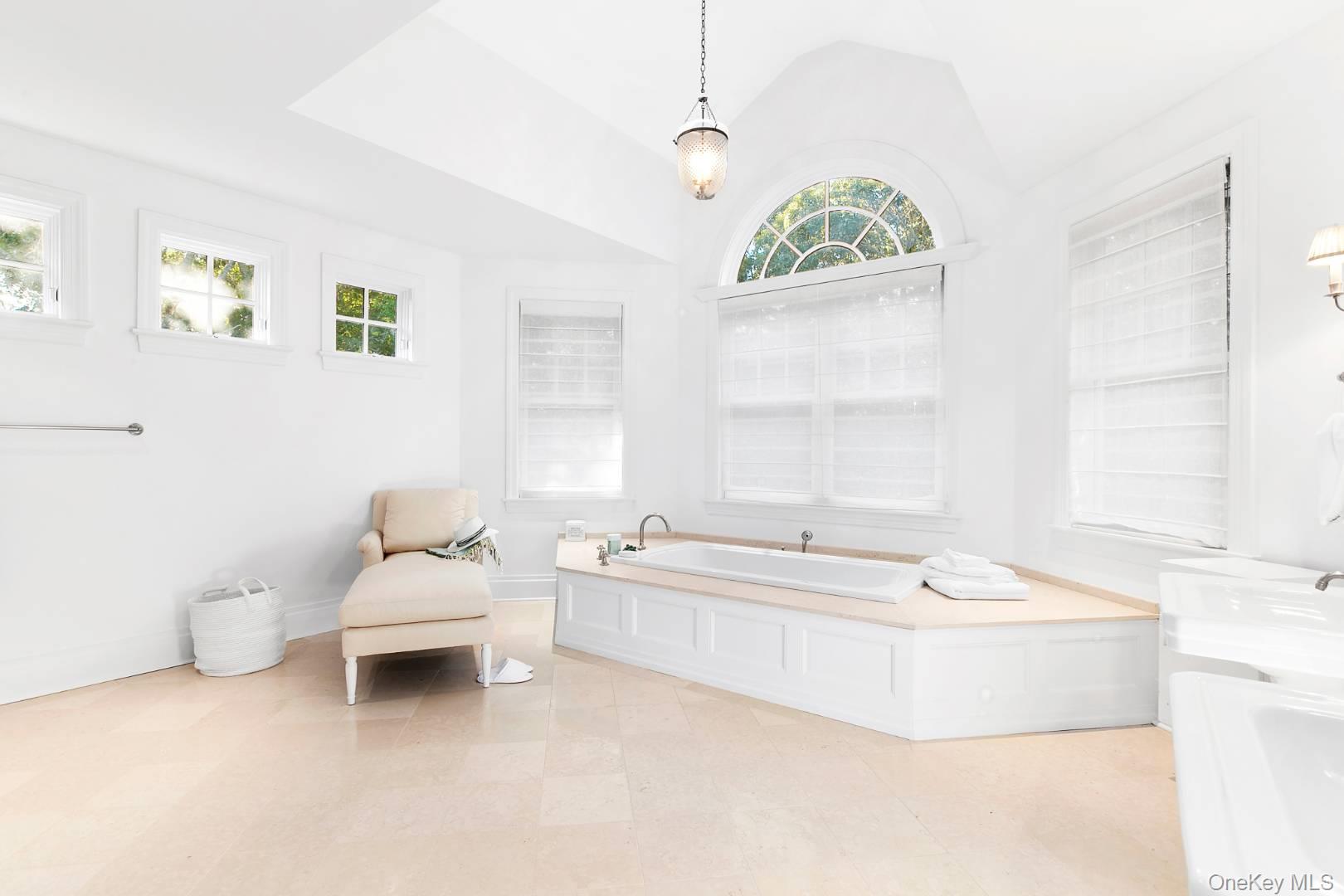 1477 Deerfield Road Water Mill, NY 11976 - Photo 16 of 17 a spacious bathroom with a bathtub and window