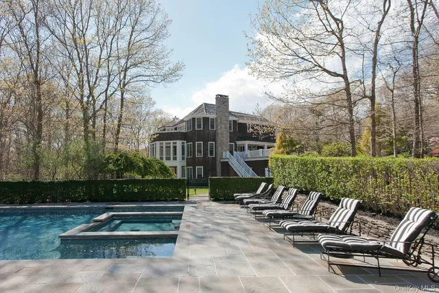 a view of a bench in a backyard