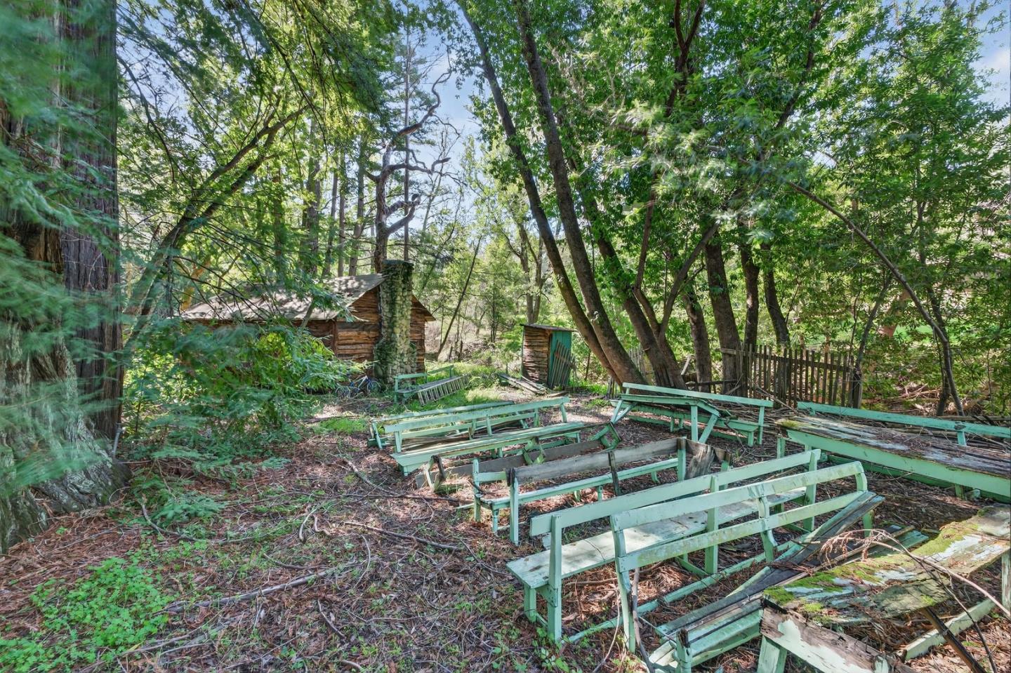 3215 Woodside Road Woodside, CA 94062 - Photo 12 of 24 a backyard of a house with outdoor seating