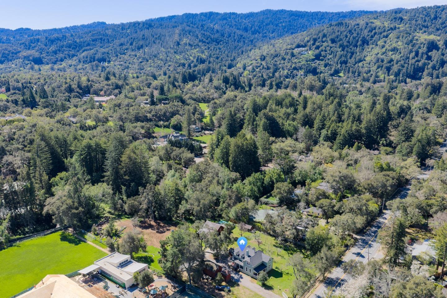 3215 Woodside Road Woodside, CA 94062 - Photo 17 of 24 an aerial view of a forest with houses