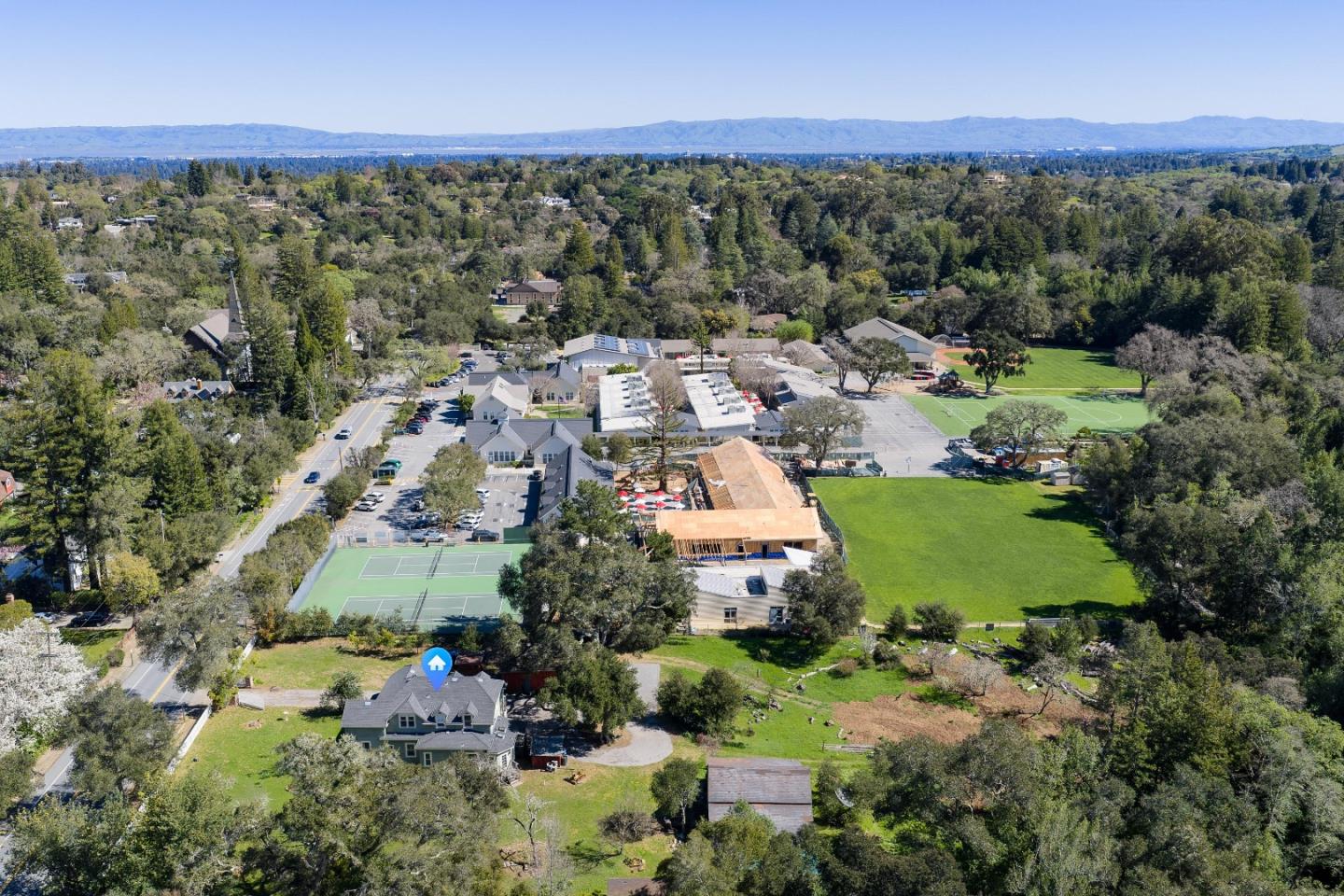 3215 Woodside Road Woodside, CA 94062 - Photo 20 of 24 a view of a house with a garden