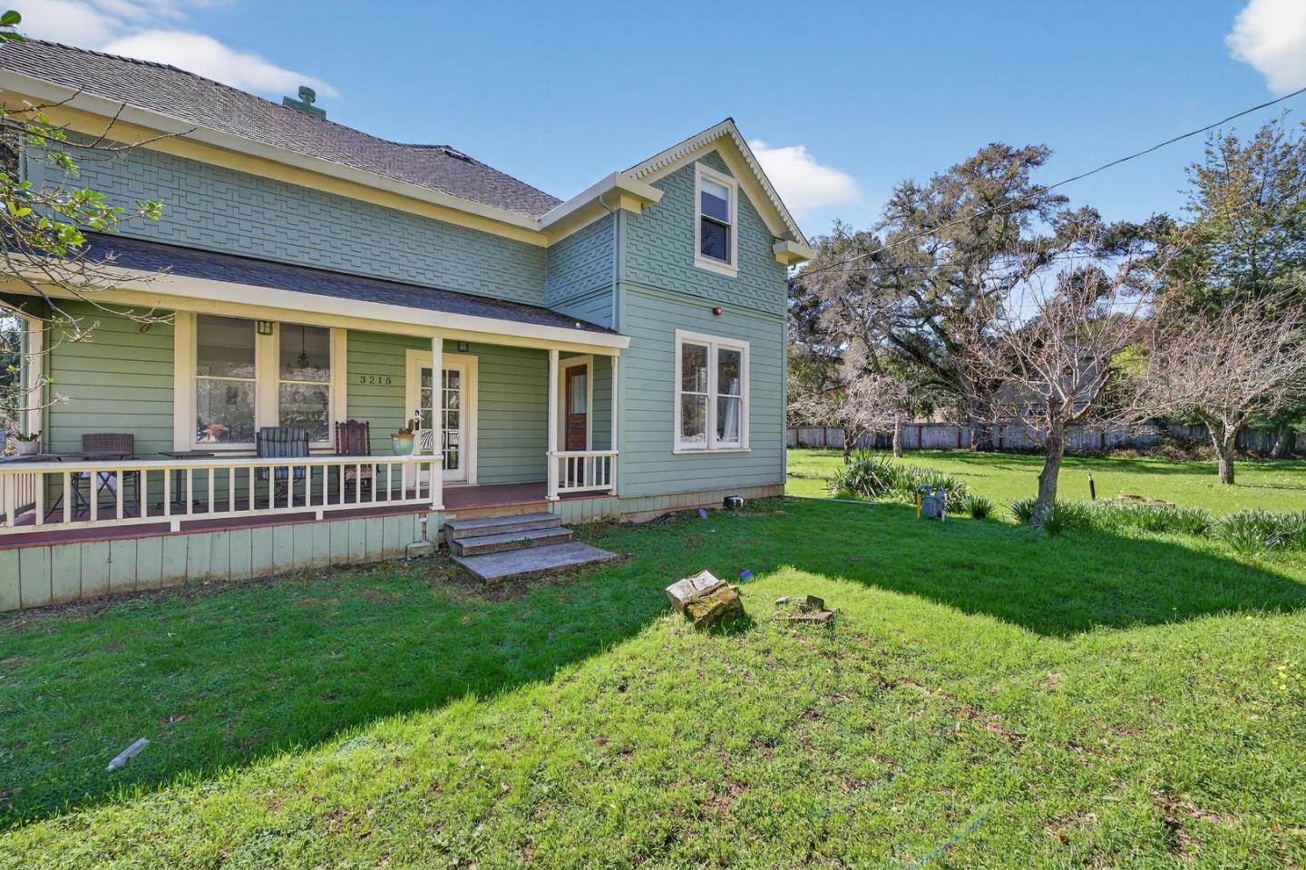 3215 Woodside Road Woodside, CA 94062 - Photo 2 of 24 front view of a house with a yard