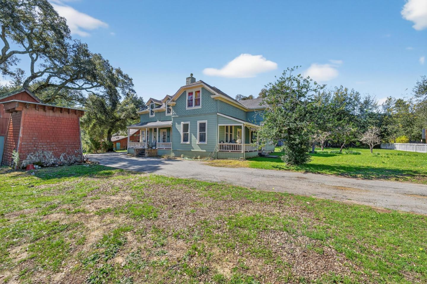 3215 Woodside Road Woodside, CA 94062 - Photo 3 of 24 a front view of house with yard and green space