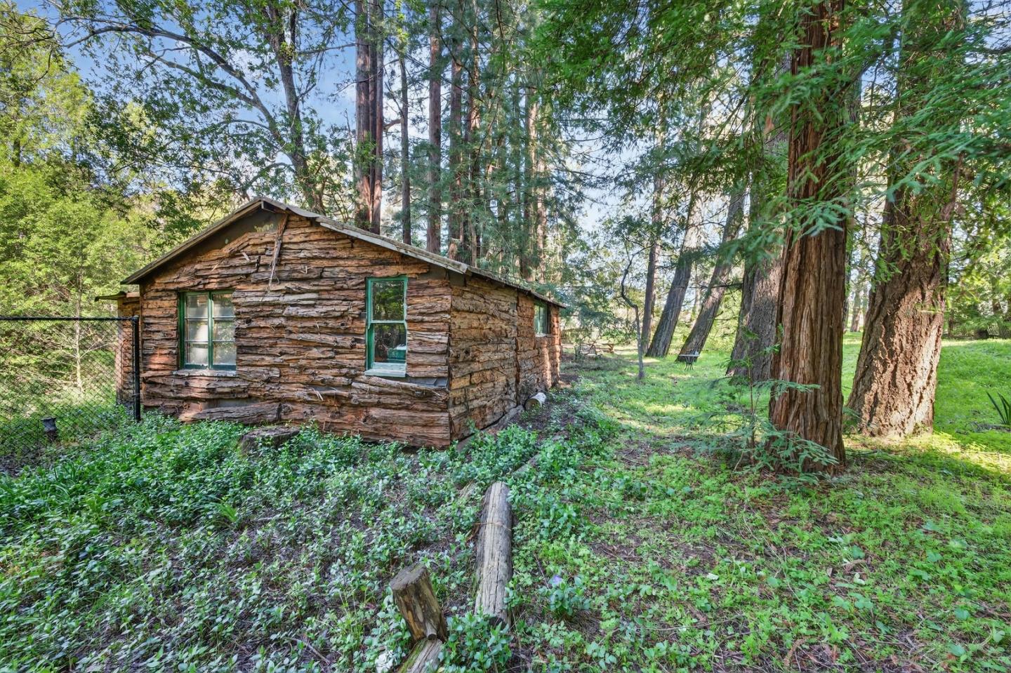 3215 Woodside Road Woodside, CA 94062 - Photo 10 of 24 a backyard of a house with lots of green space