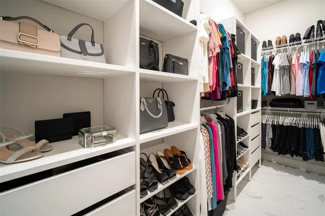 a view of kitchen island with sink