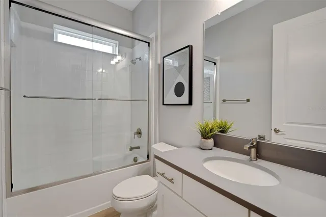 a view of an ocean and trees