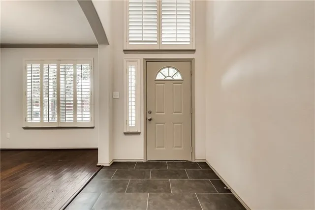 a view of an empty room and window