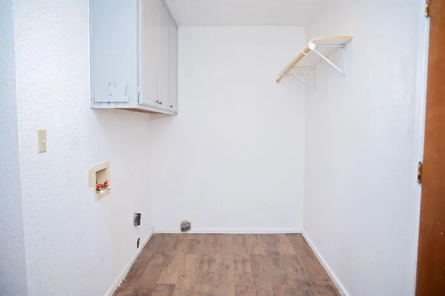 a view of small space with racks on the wall