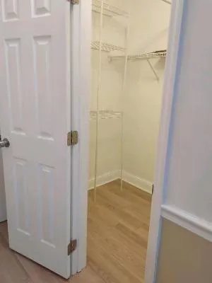 a bathroom with a glass shower door