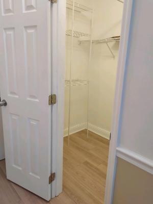 2501 Riverside Drive, Unit 218 Coral Springs, FL 33065 - Photo 6 of 15 a bathroom with a glass shower door