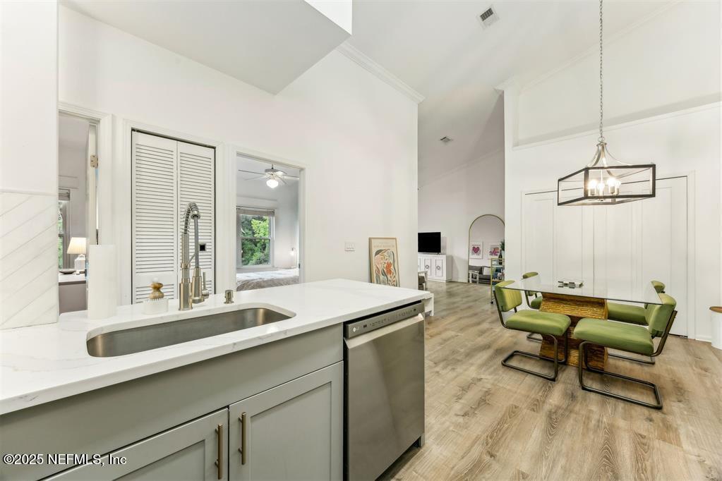 1601 Nectarine Street, Unit I5 Fernandina Beach, FL 32034 - Photo 7 of 22 a living room with furniture and wooden floor