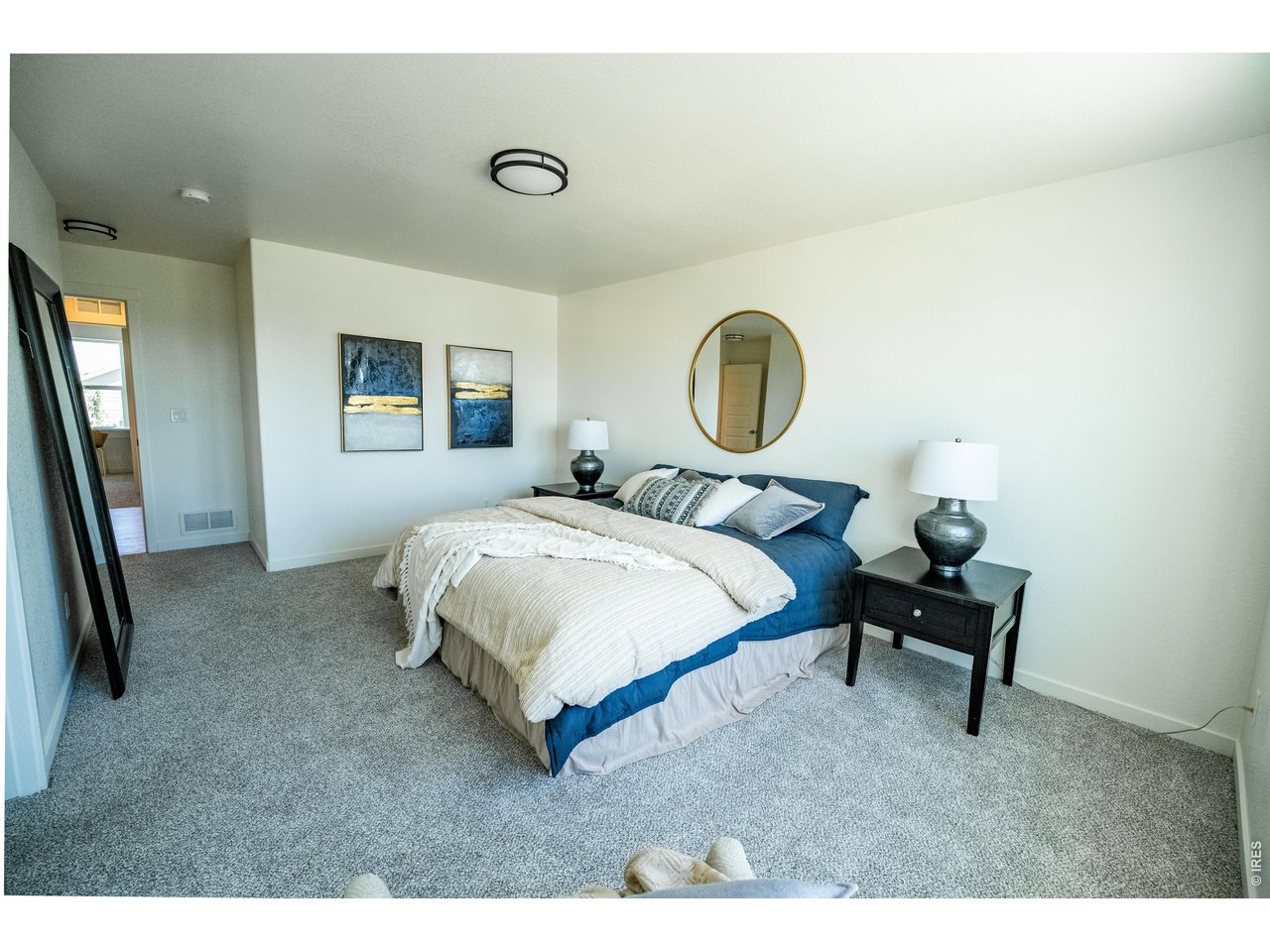 7905 West 11th St Road Greeley, CO 80634 - Photo 23 of 34 Primary bedroom with a king bed