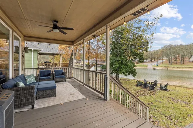 a view of a balcony with wooden floor