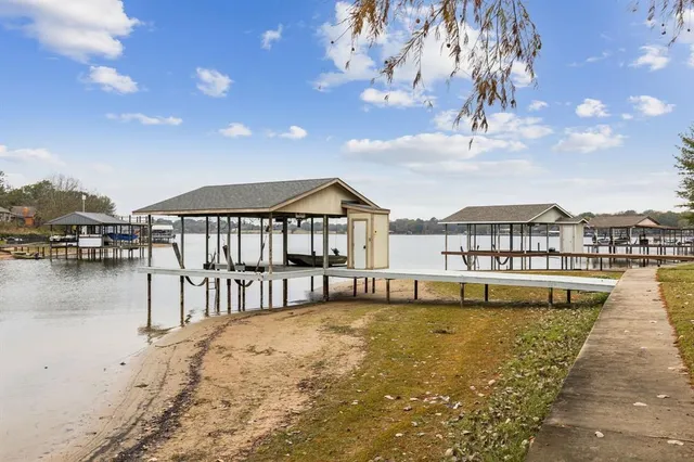 a view of a patio with chairs and a table