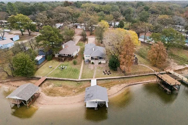 an aerial view of residential house with outdoor space