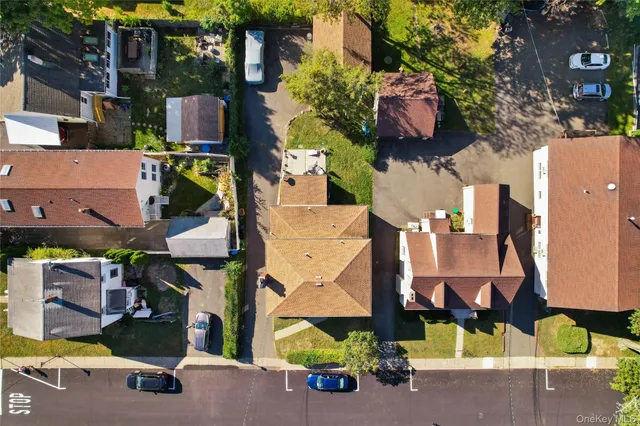 an aerial view of houses with outdoor space