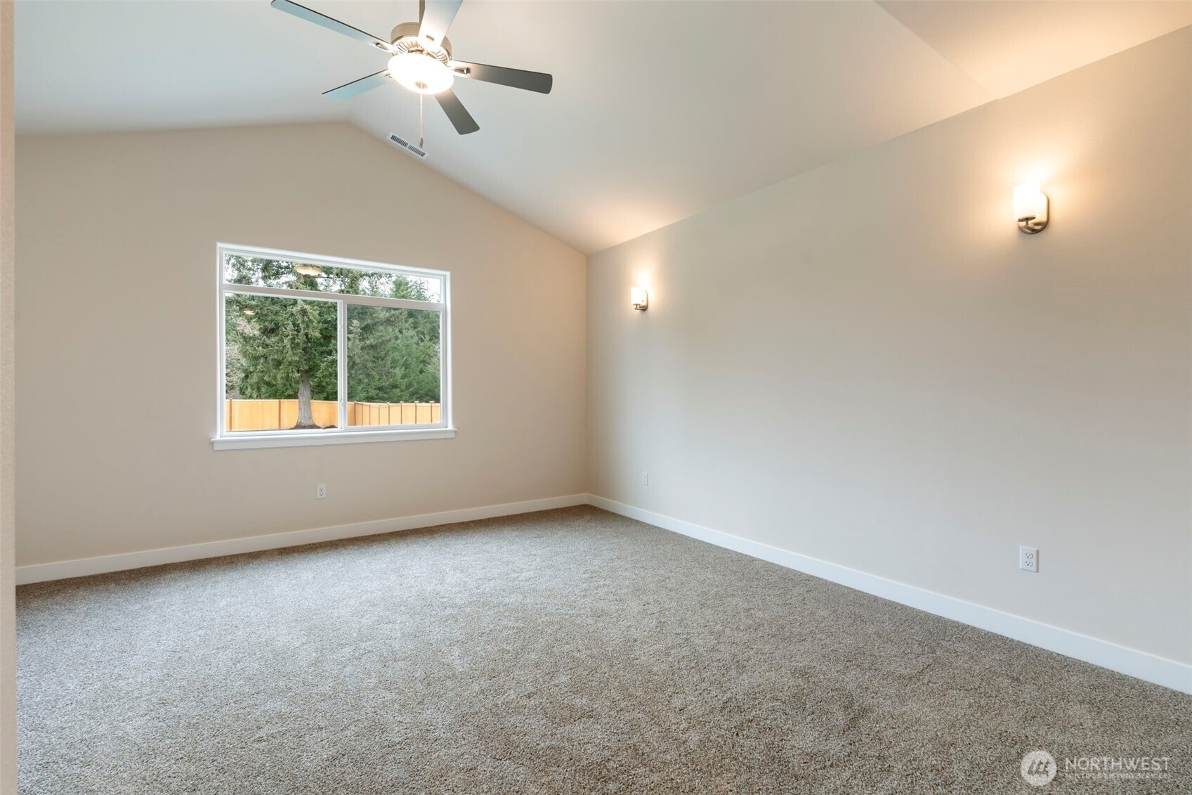 841 Barbara Lane, Unit SW Centralia, WA 98531 - Photo 14 of 28 an empty room with a window and a fan