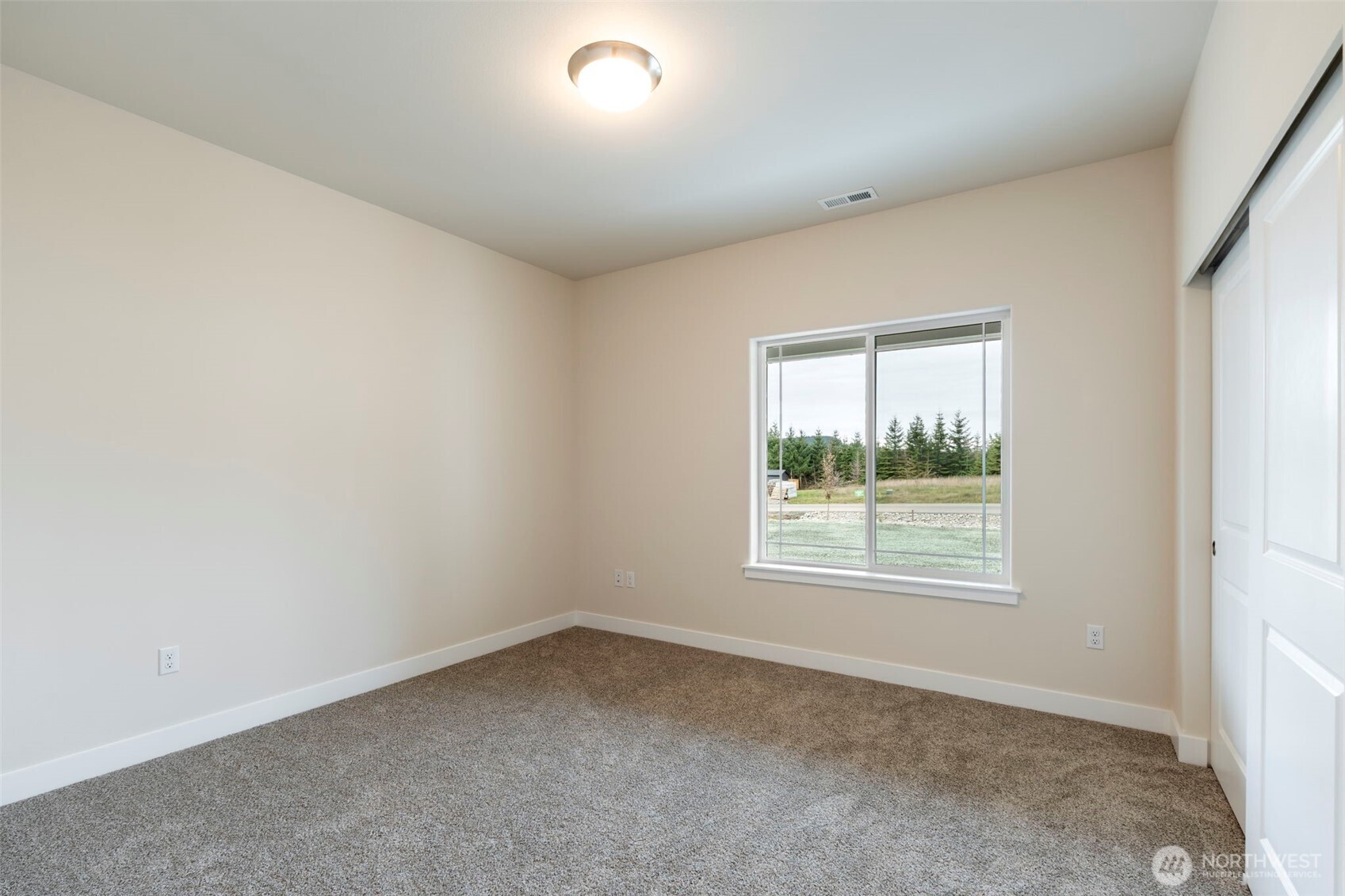 841 Barbara Lane, Unit SW Centralia, WA 98531 - Photo 26 of 28 an empty room with a window