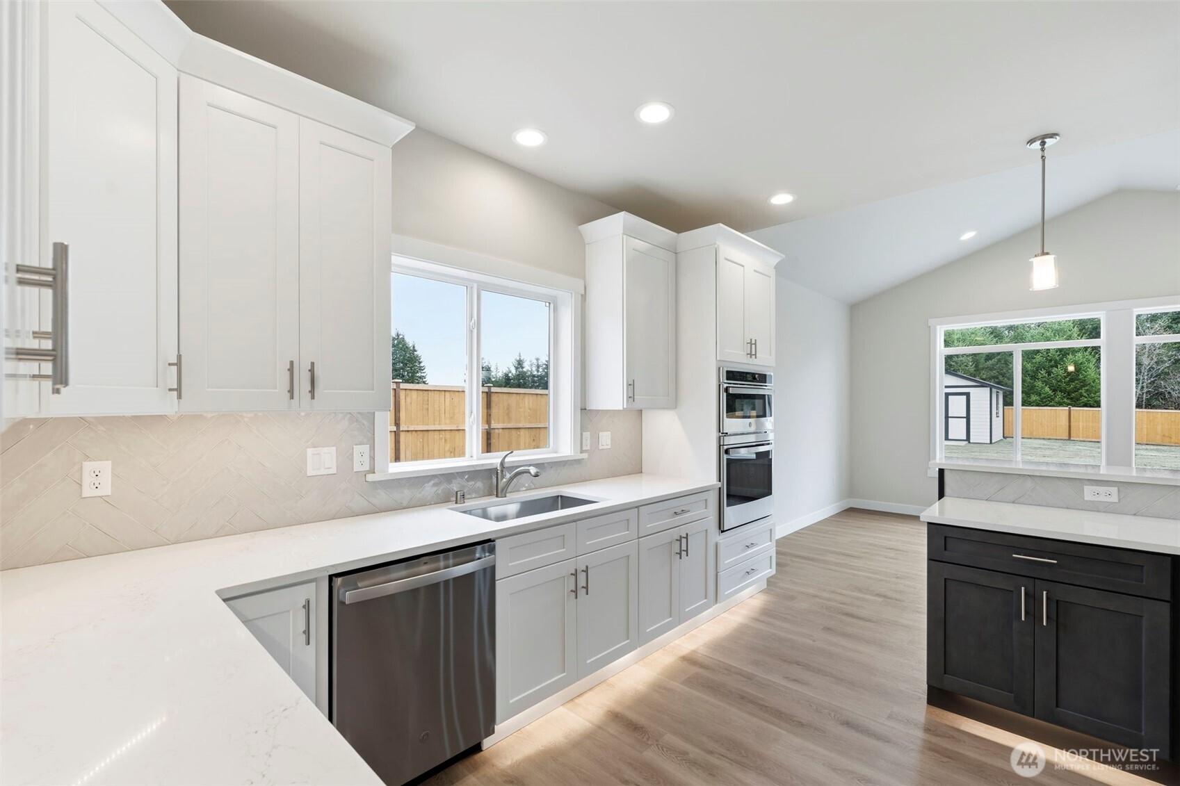 841 Barbara Lane, Unit SW Centralia, WA 98531 - Photo 5 of 28 a kitchen with stainless steel appliances granite countertop a sink stove and cabinets