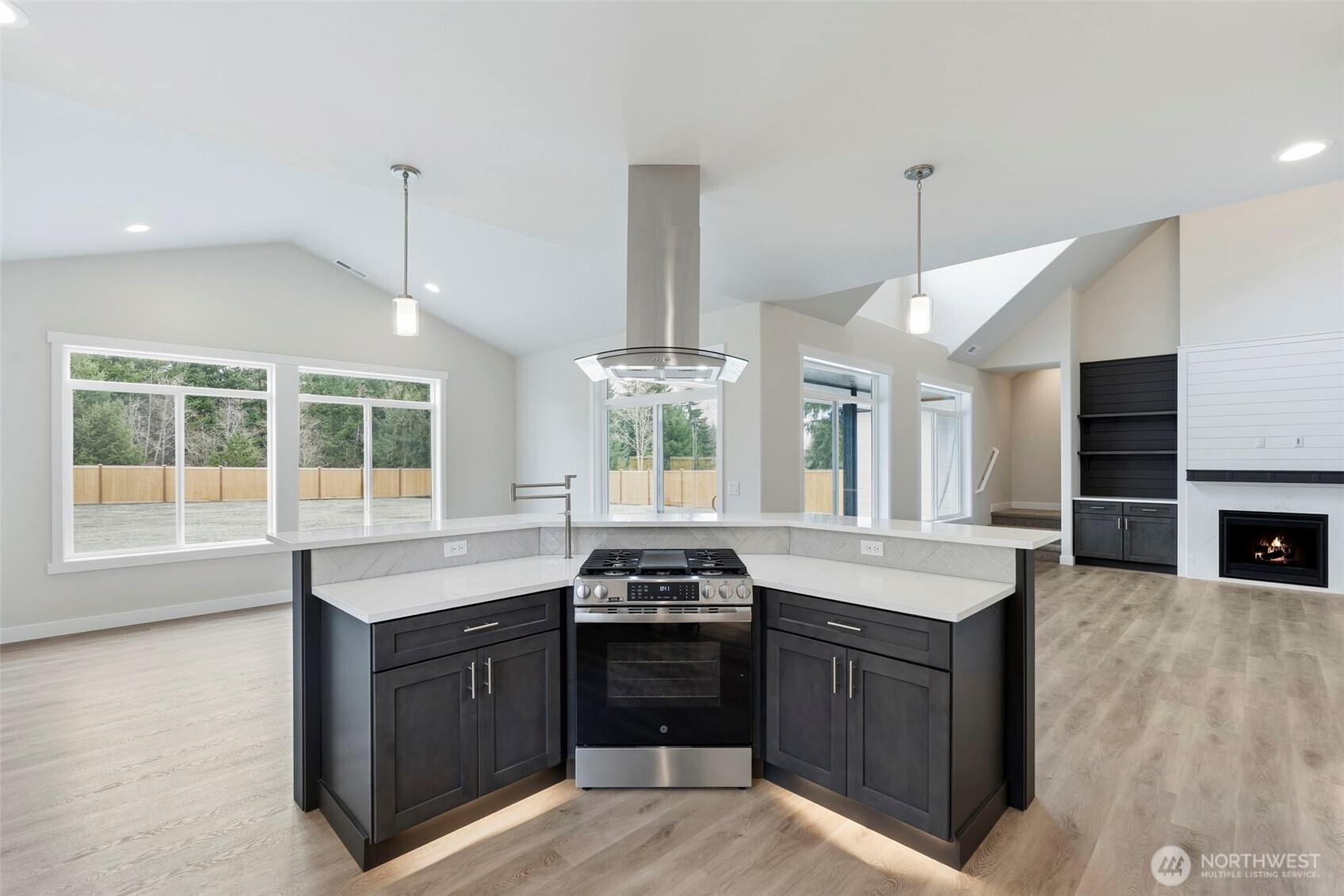 841 Barbara Lane, Unit SW Centralia, WA 98531 - Photo 7 of 28 a kitchen with granite countertop a stove and a sink