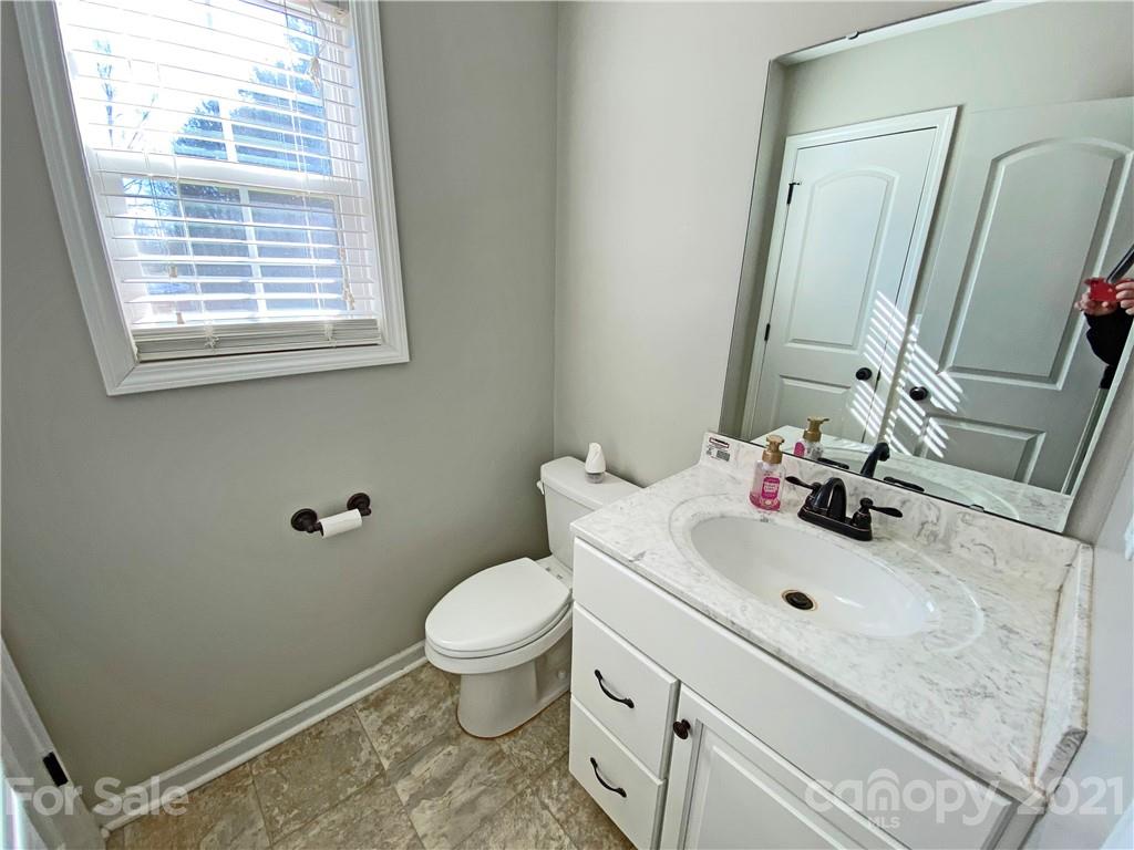 1817 St Marks Church Road Crouse, NC 28033 - Photo 17 of 35 a bathroom with a sink toilet and mirror