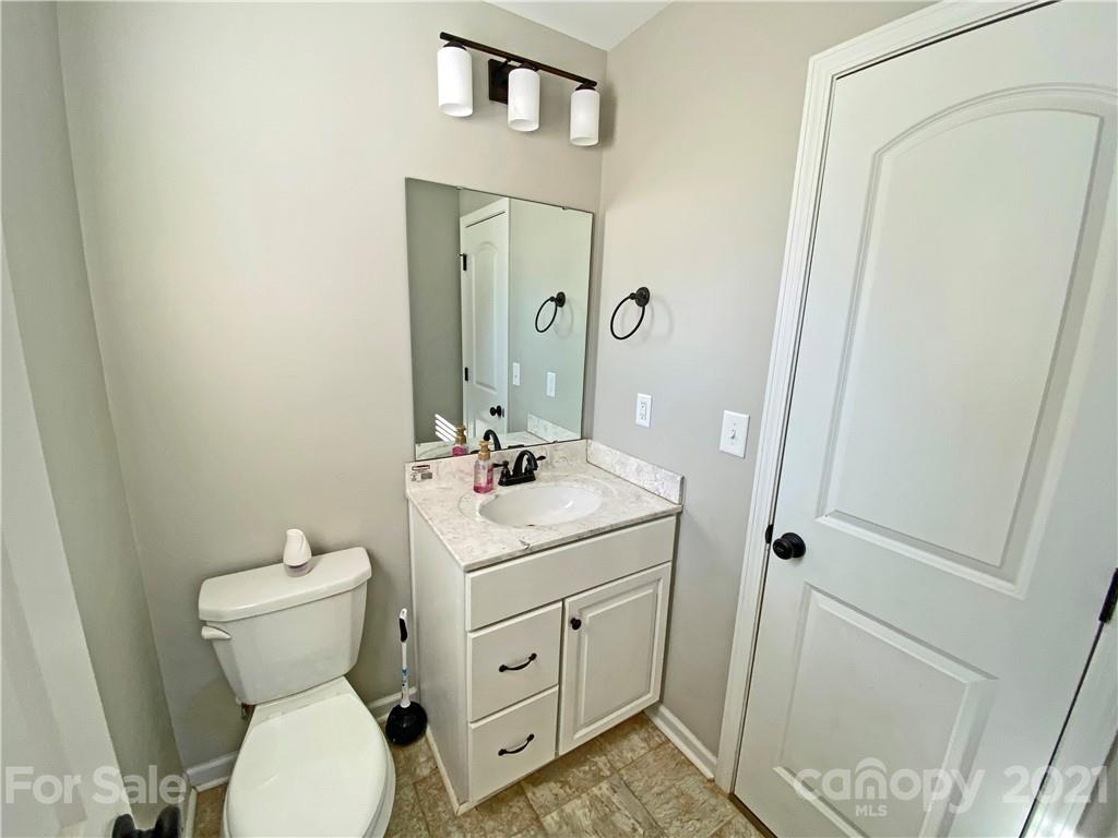 1817 St Marks Church Road Crouse, NC 28033 - Photo 18 of 35 a bathroom with a toilet sink and mirror