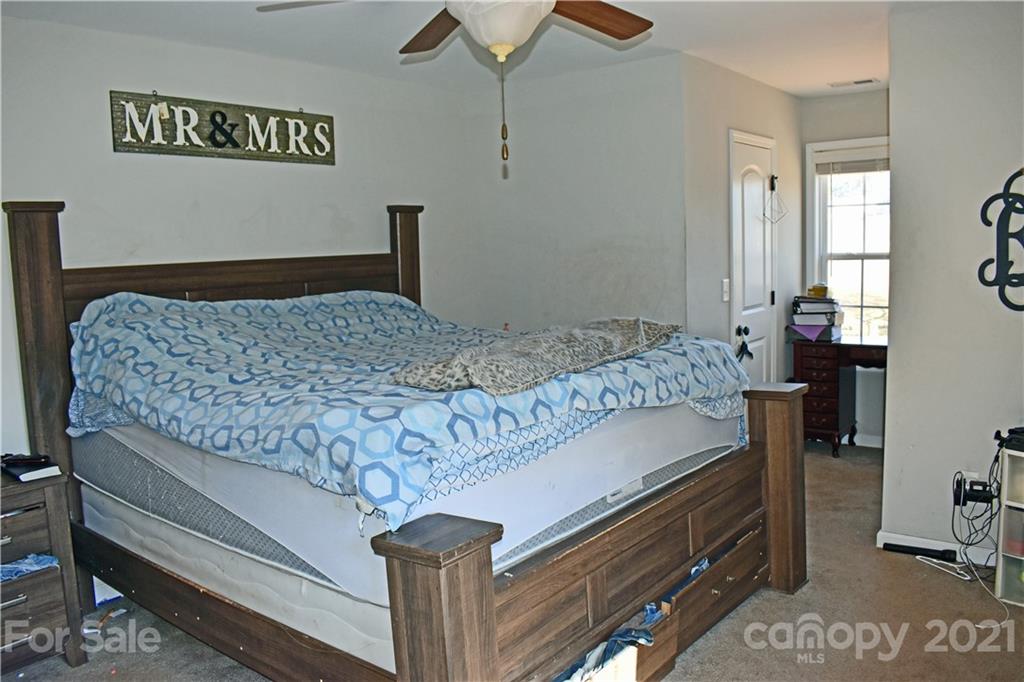 1817 St Marks Church Road Crouse, NC 28033 - Photo 19 of 35 a bedroom with a bed and a dresser in it