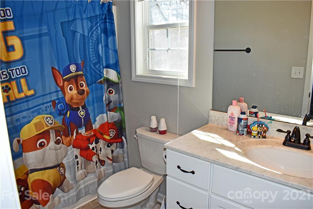 1817 St Marks Church Road Crouse, NC 28033 - Photo 28 of 35 a bathroom with a toilet sink and mirror