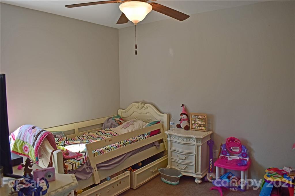 1817 St Marks Church Road Crouse, NC 28033 - Photo 29 of 35 a bedroom with a bed and toys