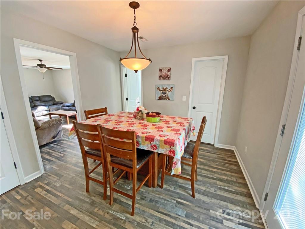1817 St Marks Church Road Crouse, NC 28033 - Photo 8 of 35 a view of a dining room with a table and chairs