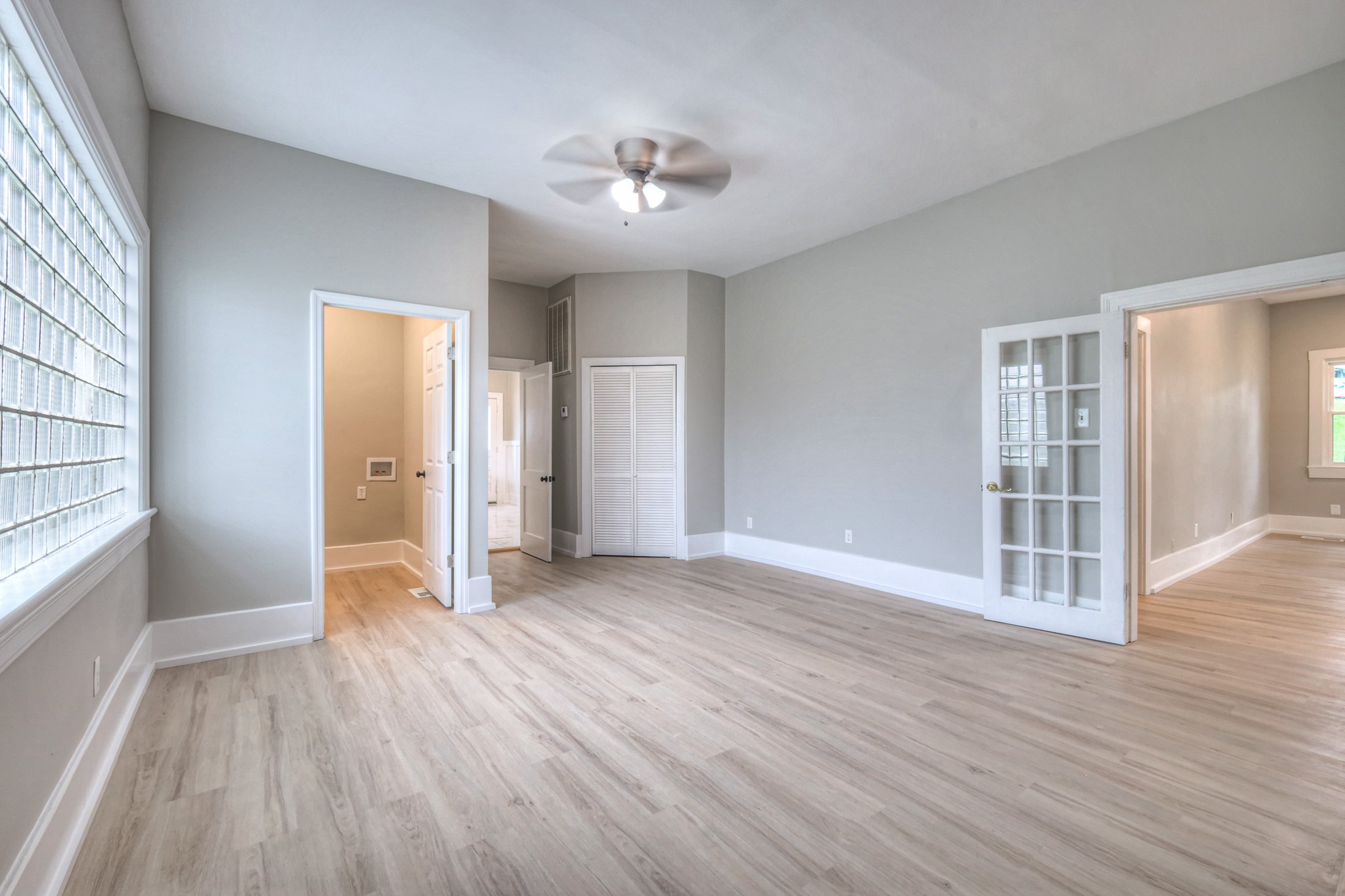 108 Church Street Mount Pleasant, TN 38474 - Photo 19 of 45 a view of empty room with wooden floor and fan