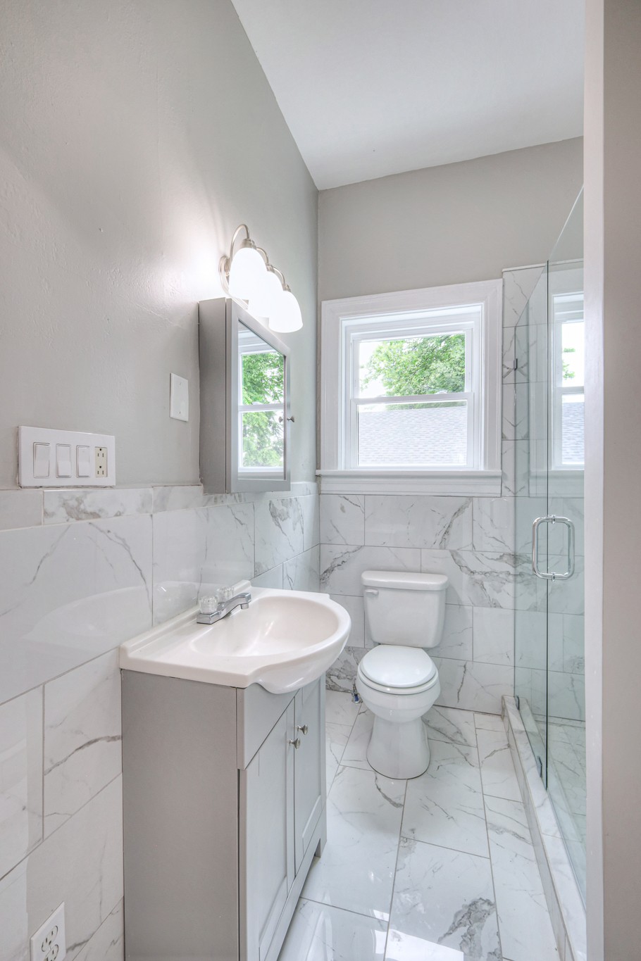 108 Church Street Mount Pleasant, TN 38474 - Photo 26 of 45 a bathroom with a sink a toilet and a mirror