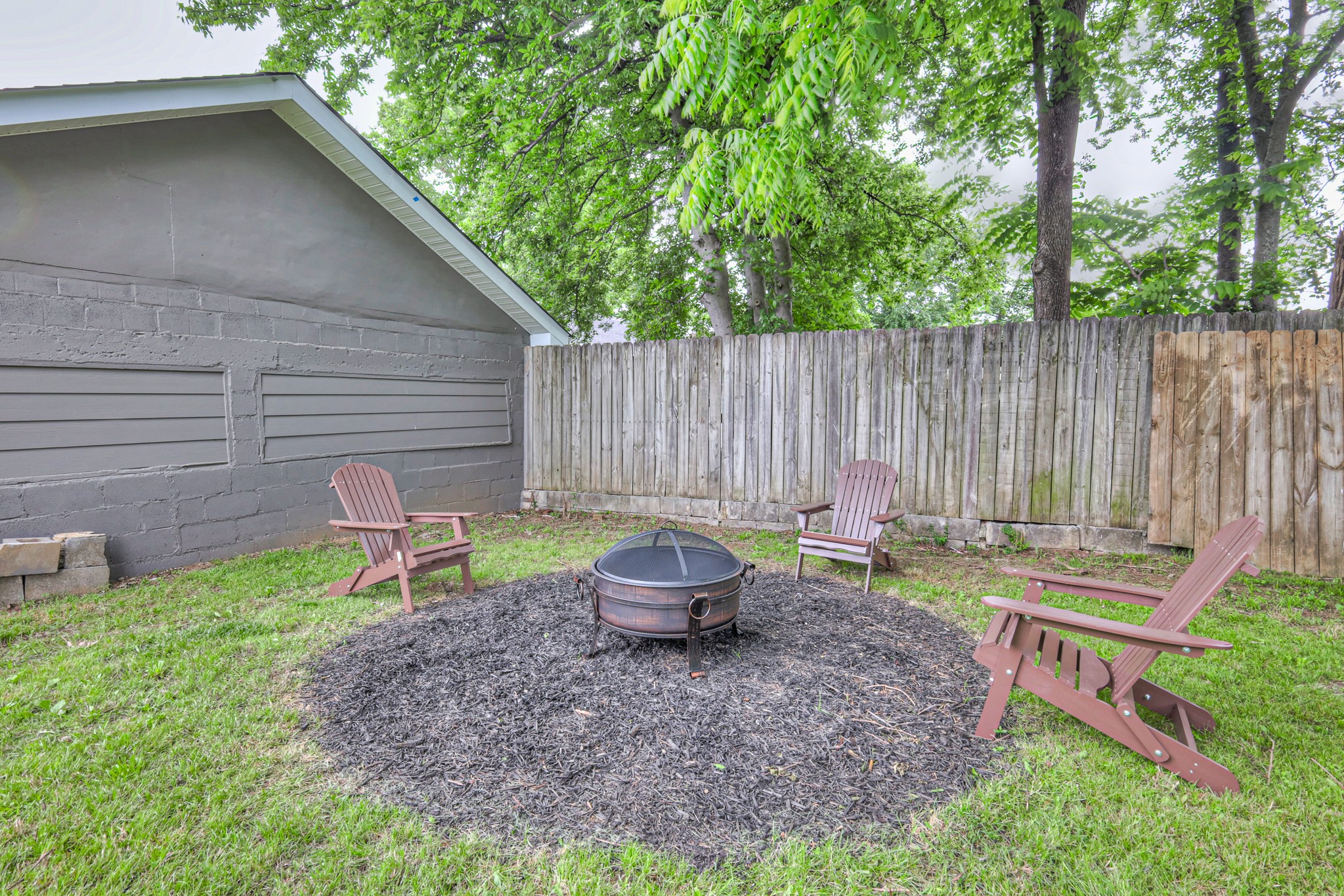 108 Church Street Mount Pleasant, TN 38474 - Photo 37 of 45 a backyard of a house with table and chairs