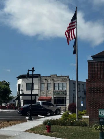 a front view of a building with street view