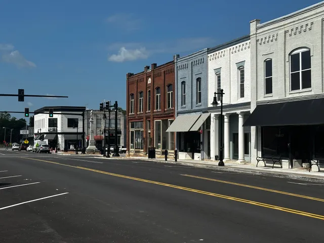 a view of a building and a street