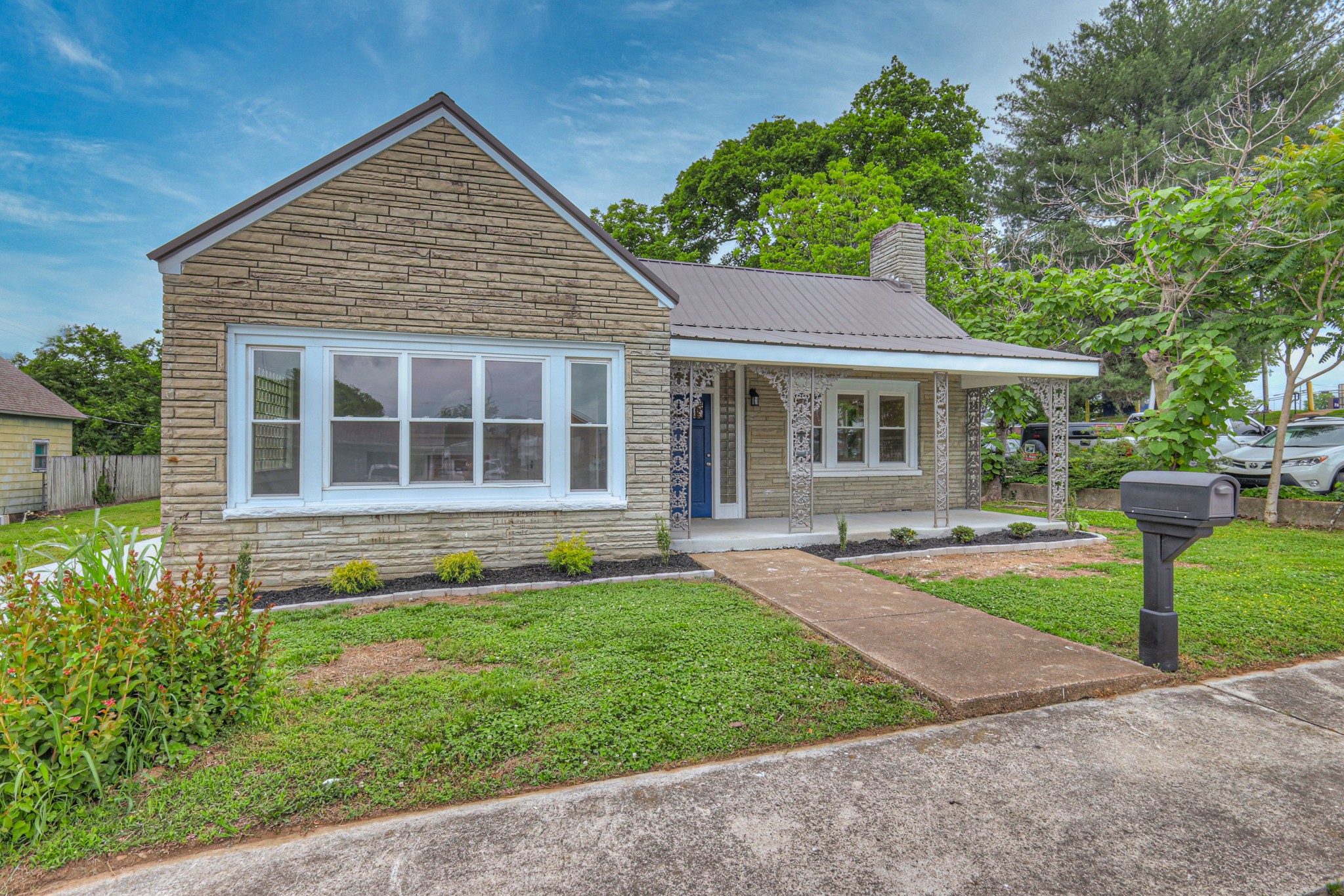 108 Church Street Mount Pleasant, TN 38474 - Photo 45 of 45 front view of a house with a yard