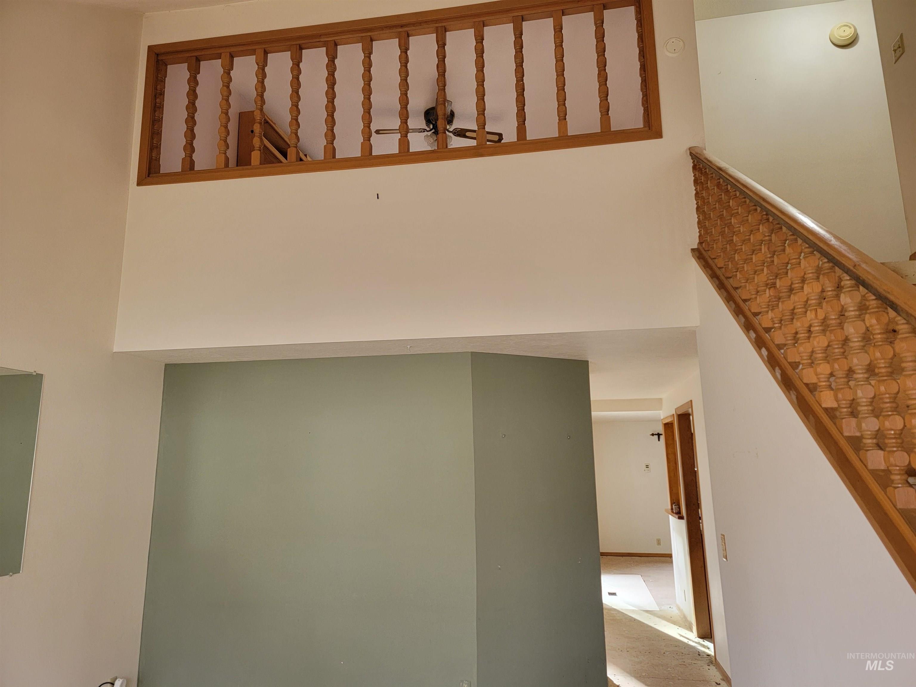 3311 Snowflake Way Boise, ID 83706 - Photo 5 of 14 Staircase featuring a towering ceiling