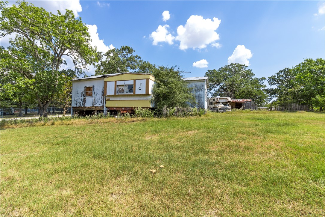 109 Mohawk Trail Somerville, TX 77879 - Photo 10 of 12 Rear view of house with a yard