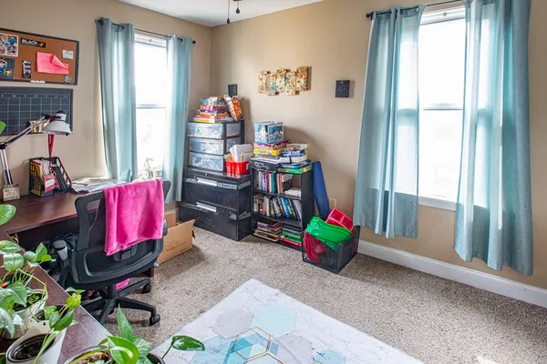 a room with toys and a wooden floor