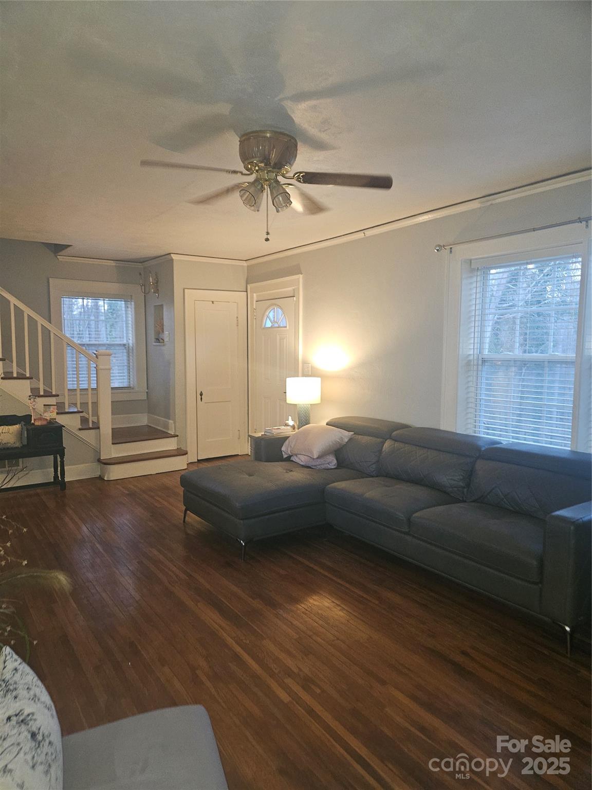 313 Mountain Creek Road Albemarle, NC 28001 - Photo 15 of 25 a living room with furniture and a wooden floor