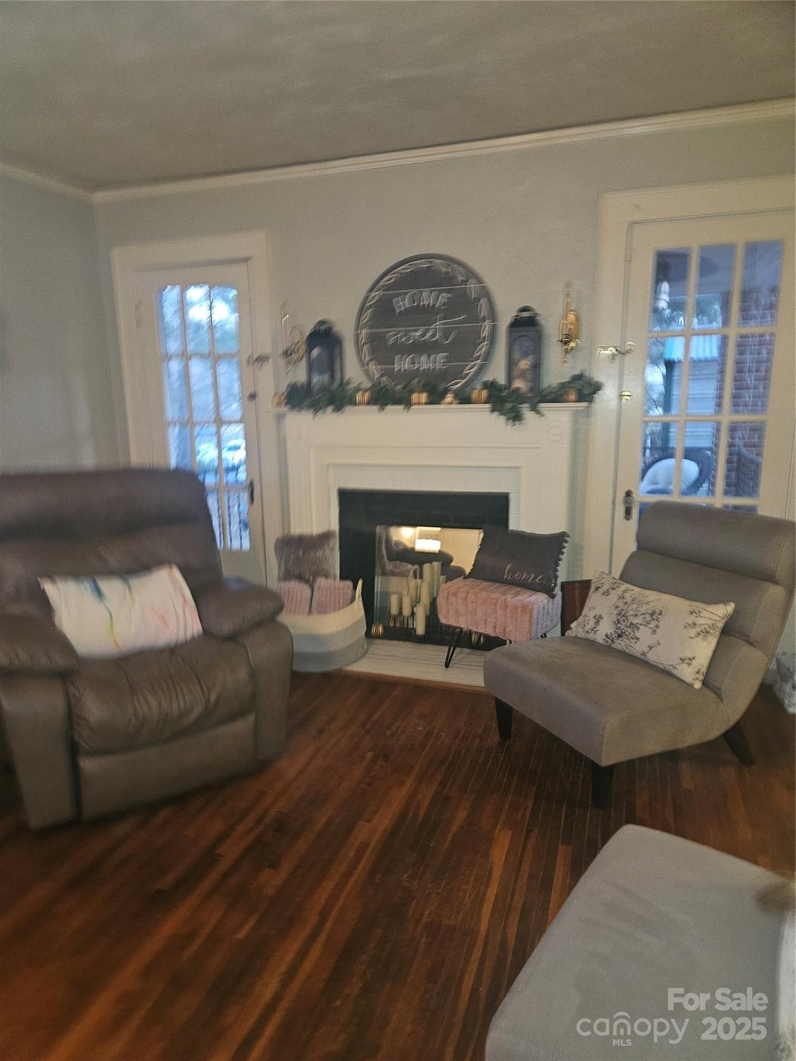 313 Mountain Creek Road Albemarle, NC 28001 - Photo 16 of 25 a living room with furniture and fireplace