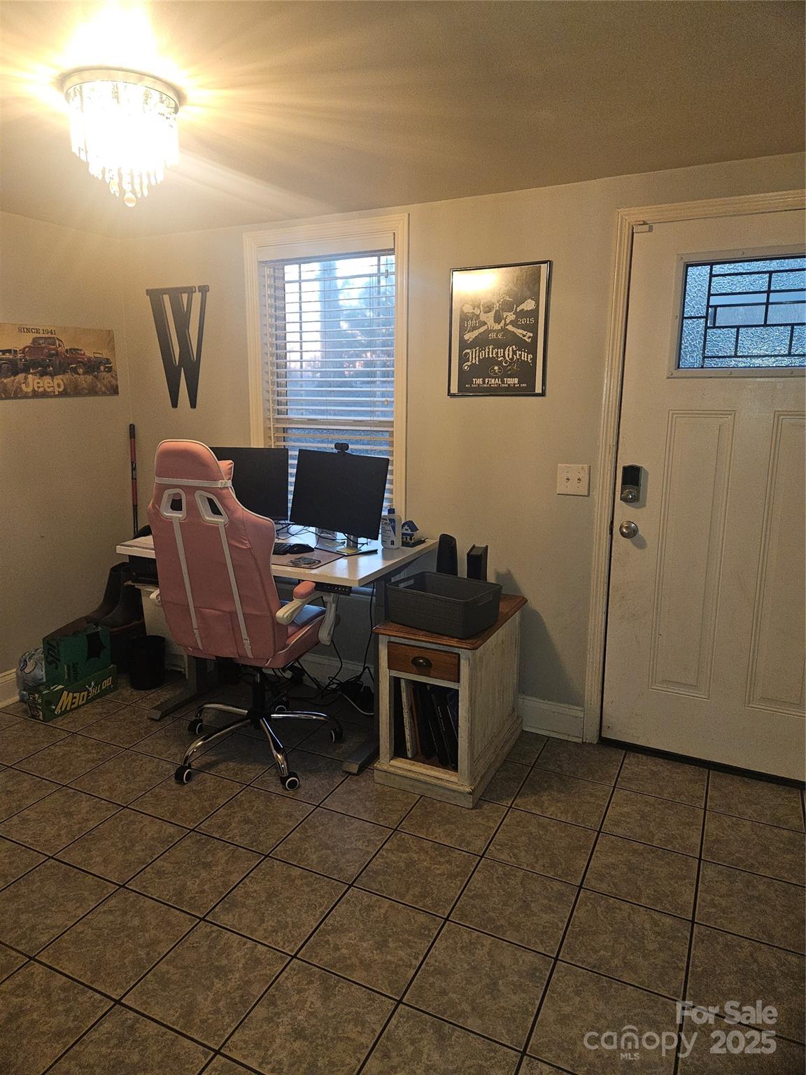 313 Mountain Creek Road Albemarle, NC 28001 - Photo 17 of 25 a view of a workspace with furniture and a window