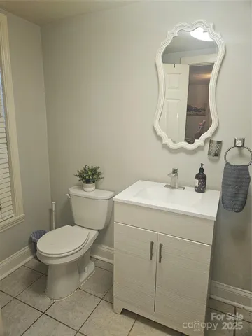 a bathroom with a sink and toilet