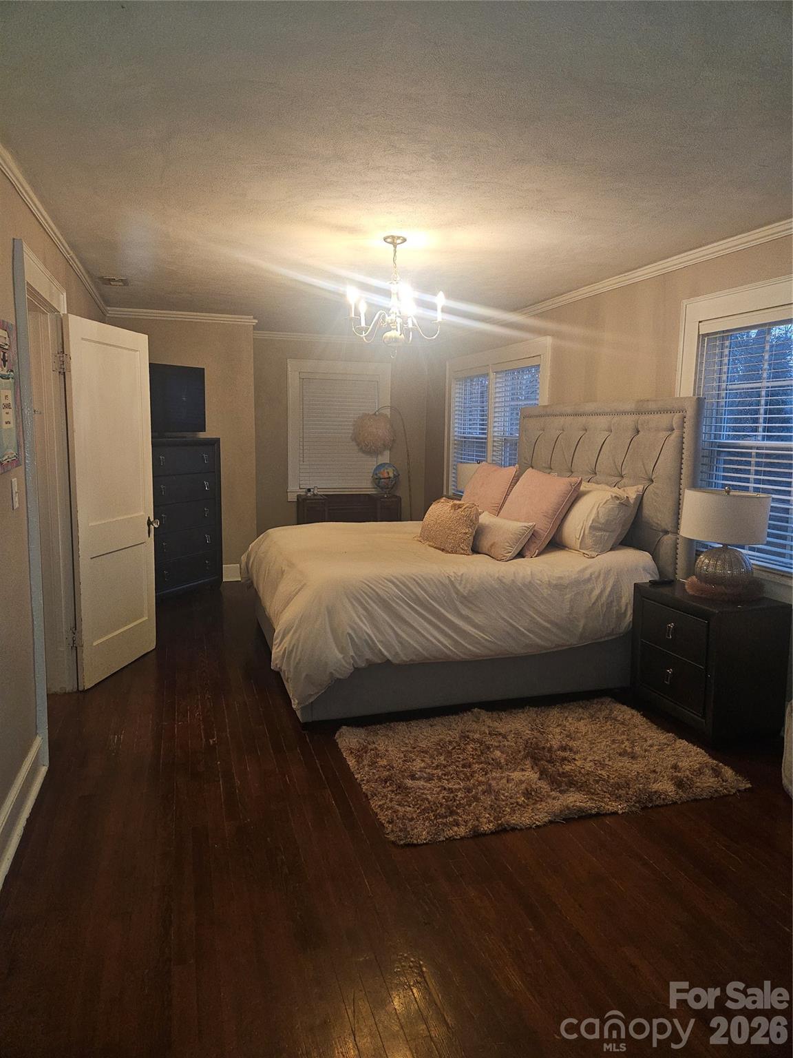 313 Mountain Creek Road Albemarle, NC 28001 - Photo 20 of 23 a bedroom with a bed and a night stand