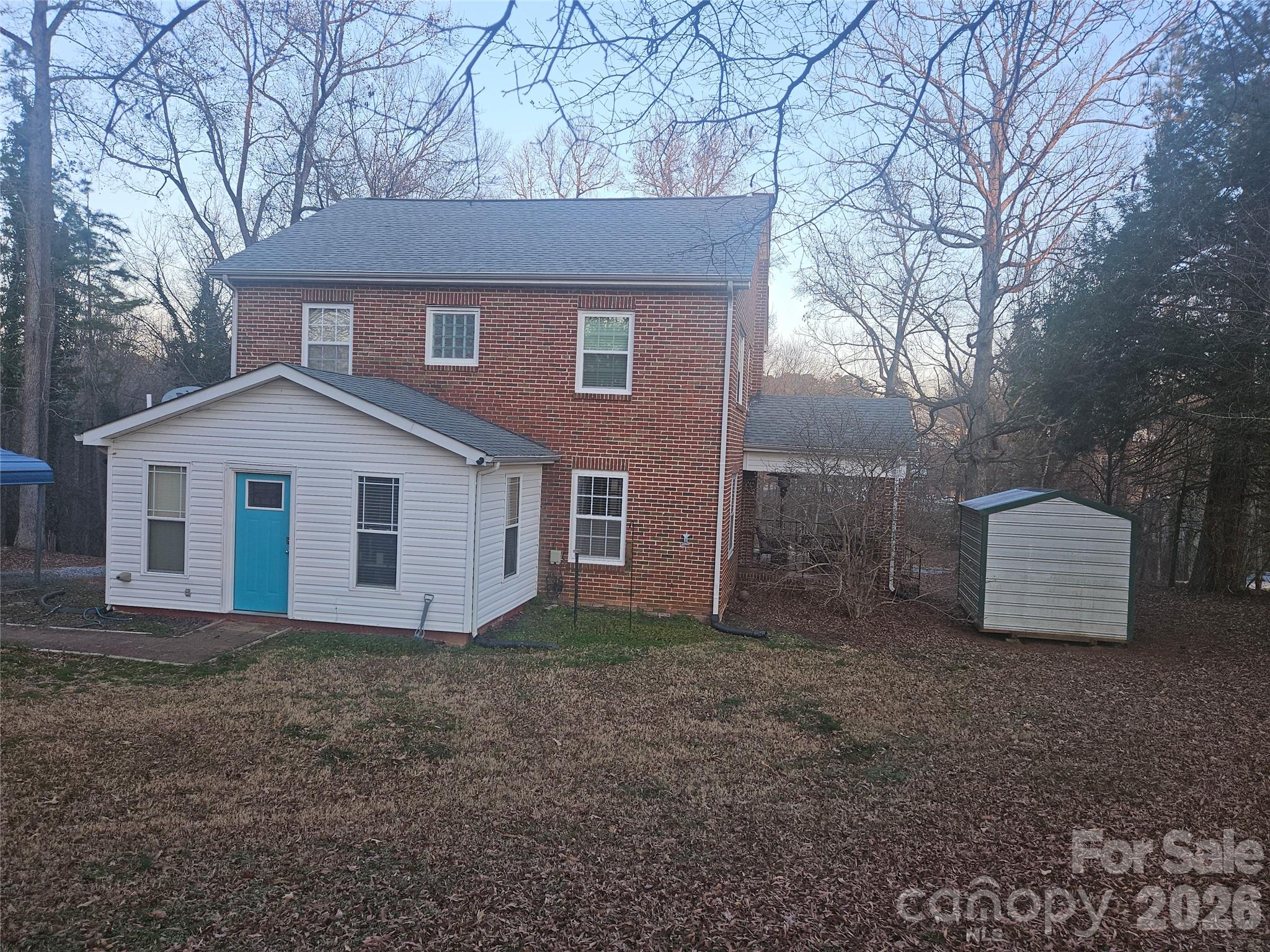 313 Mountain Creek Road Albemarle, NC 28001 - Photo 2 of 23 a front view of a house with a yard