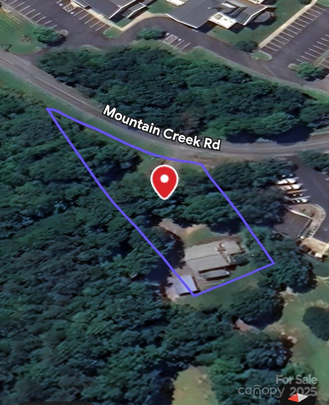 313 Mountain Creek Road Albemarle, NC 28001 - Photo 6 of 25 an aerial view of a backyard